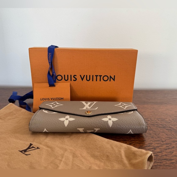 Louis Vuitton Handbags - Louis Vuitton Monogram Empreinte Leather Sarah Wallet iw/ COA, Dust Bag & Box